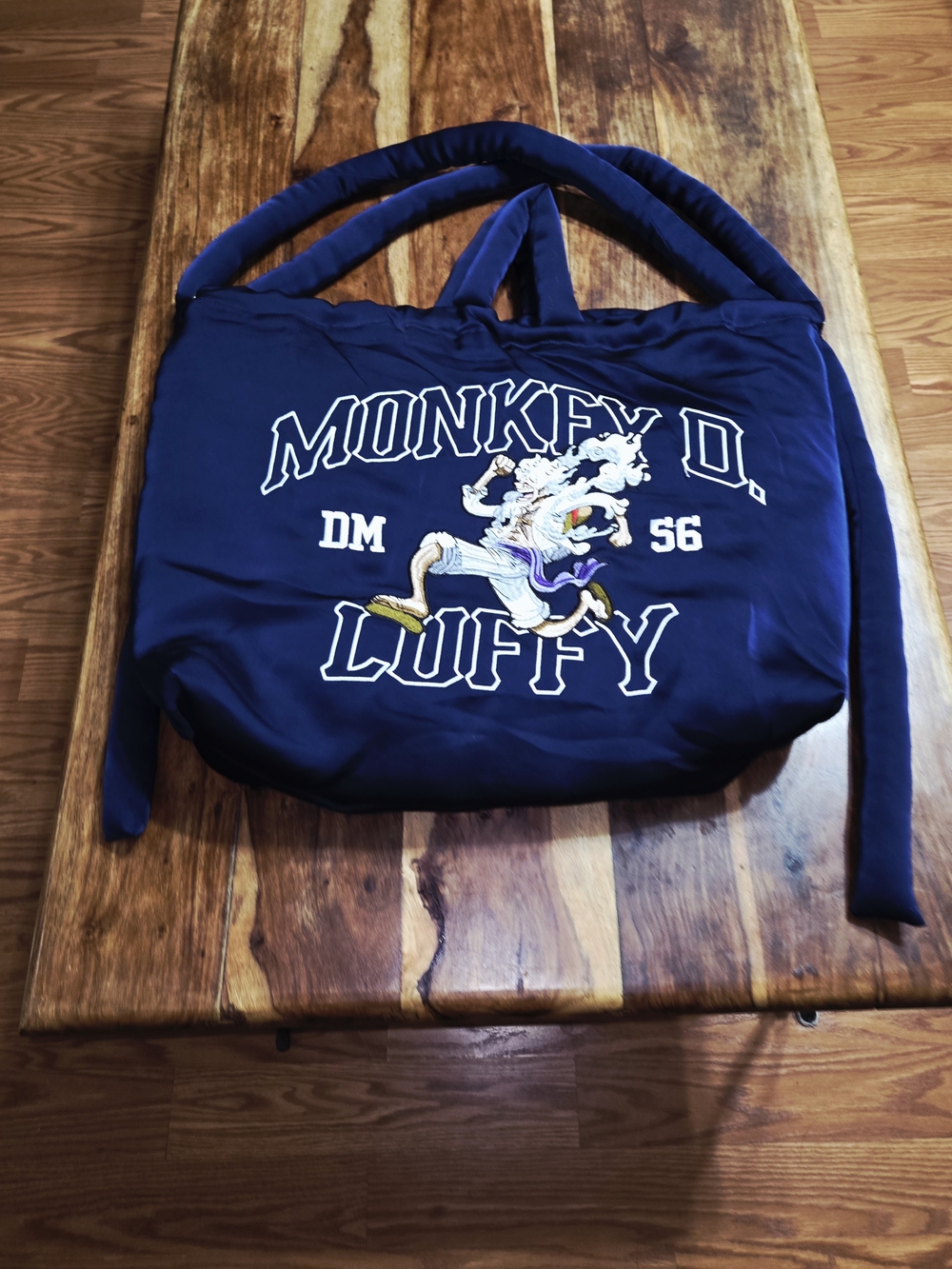 Dim Mak x One Piece "Monkey D. Luffy" Embroidered Tote Bag.
